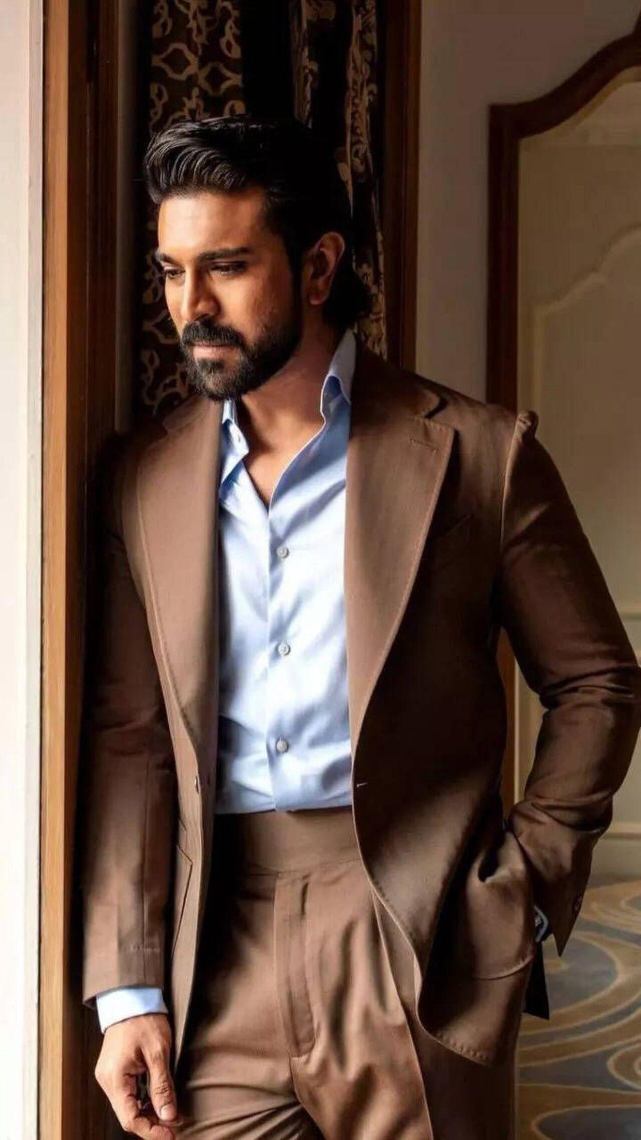 This double-breasted suit and crisp, tailored shirt prove his formalwear game is always clean, fitted, and powerful.